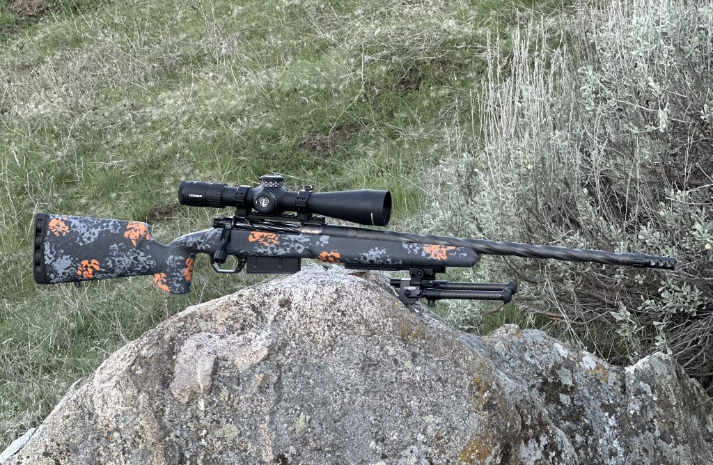 Rifle Raffle rifle setup in the field with bipod and scope.